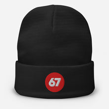 Load image into Gallery viewer, Black beanie with a red circle featuring the number 67 on a white background